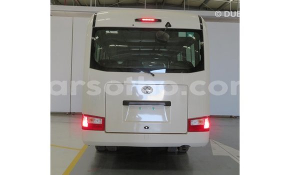 Sayi Imported Toyota Coaster White Mota in Import - Dubai a Maseru Sayi Imported Toyota Coaster White Mota in Import - Dubai a Maseru