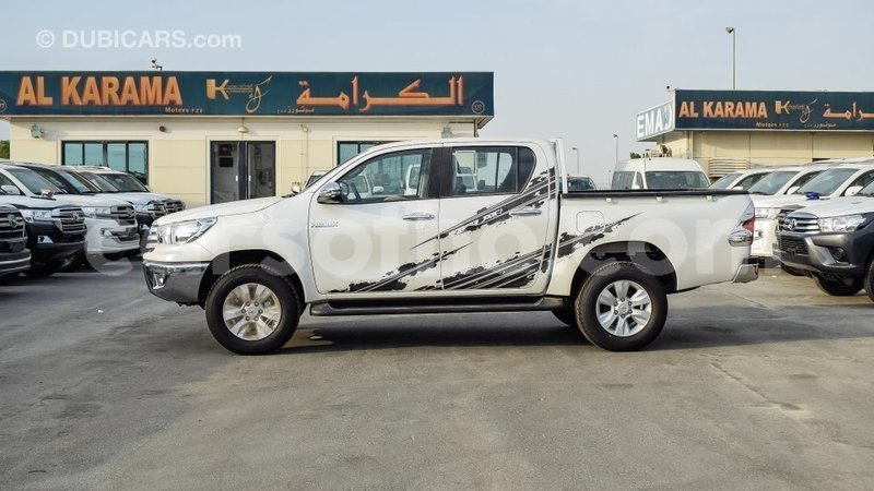 Big with watermark toyota hilux maseru import dubai 15804