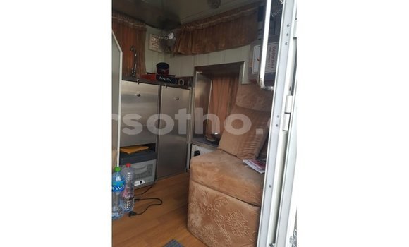 Acheter Import Voiture Kia Carens Blanc à Import - Dubai, Maseru Acheter Import Voiture Kia Carens Blanc à Import - Dubai, Maseru