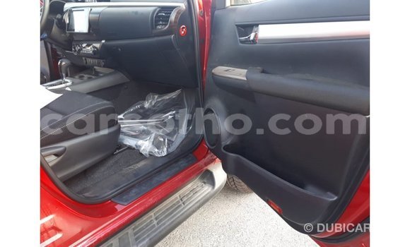 Sayi Imported Toyota Hilux Red Mota in Import - Dubai a Maseru Sayi Imported Toyota Hilux Red Mota in Import - Dubai a Maseru