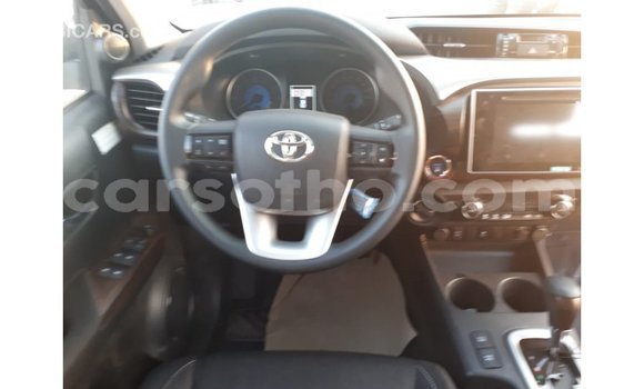 Sayi Imported Toyota Hilux Red Mota in Import - Dubai a Maseru Sayi Imported Toyota Hilux Red Mota in Import - Dubai a Maseru