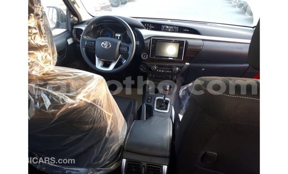 Sayi Imported Toyota Hilux Red Mota in Import - Dubai a Maseru Sayi Imported Toyota Hilux Red Mota in Import - Dubai a Maseru