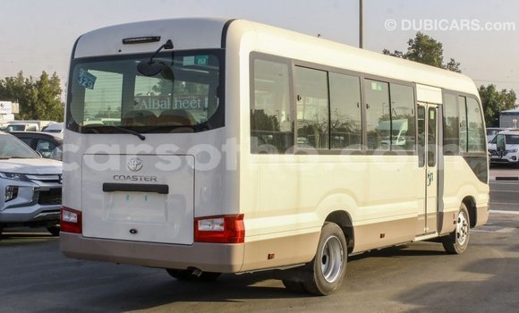 Sayi Imported Toyota Coaster White Mota in Import - Dubai a Maseru Sayi Imported Toyota Coaster White Mota in Import - Dubai a Maseru