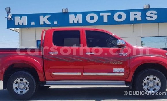 Sayi Imported Toyota Hilux Red Mota in Import - Dubai a Maseru Sayi Imported Toyota Hilux Red Mota in Import - Dubai a Maseru