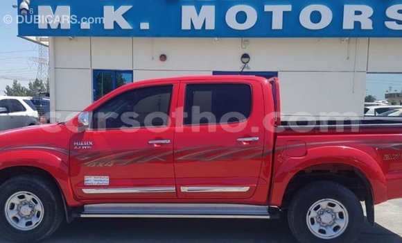 Sayi Imported Toyota Hilux Red Mota in Import - Dubai a Maseru Sayi Imported Toyota Hilux Red Mota in Import - Dubai a Maseru