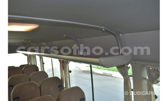 Acheter Import Voiture Toyota Coaster Blanc à Import - Dubai, Maseru Acheter Import Voiture Toyota Coaster Blanc à Import - Dubai, Maseru