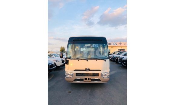 Acheter Import Voiture Toyota Coaster Blanc à Import - Dubai, Maseru Acheter Import Voiture Toyota Coaster Blanc à Import - Dubai, Maseru