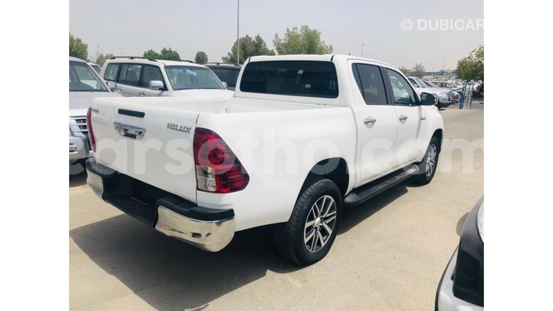 Big with watermark toyota hilux maseru import dubai 19230