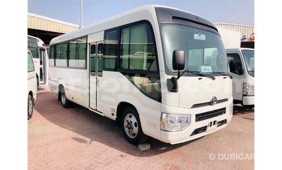 Sayi Imported Toyota Coaster White Mota in Import - Dubai a Maseru Sayi Imported Toyota Coaster White Mota in Import - Dubai a Maseru