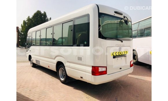 Sayi Imported Toyota Coaster White Mota in Import - Dubai a Maseru Sayi Imported Toyota Coaster White Mota in Import - Dubai a Maseru