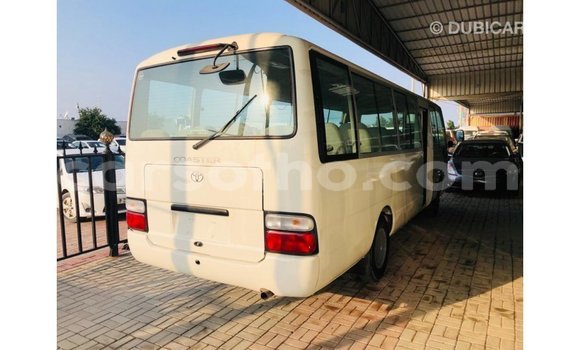 Acheter Import Voiture Toyota Coaster Blanc à Import - Dubai, Maseru Acheter Import Voiture Toyota Coaster Blanc à Import - Dubai, Maseru