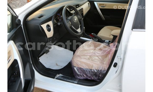 Sayi Imported Toyota Corolla White Mota in Import - Dubai a Maseru Sayi Imported Toyota Corolla White Mota in Import - Dubai a Maseru