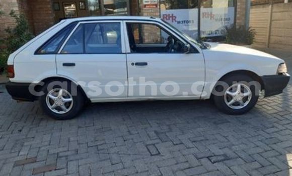Sayi Na hannu Mazda 323 White Mota in Butha–Buthe a Thaba-Tseka Sayi Na hannu Mazda 323 White Mota in Butha–Buthe a Thaba-Tseka