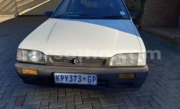 Sayi Na hannu Mazda 323 White Mota in Butha–Buthe a Thaba-Tseka Sayi Na hannu Mazda 323 White Mota in Butha–Buthe a Thaba-Tseka