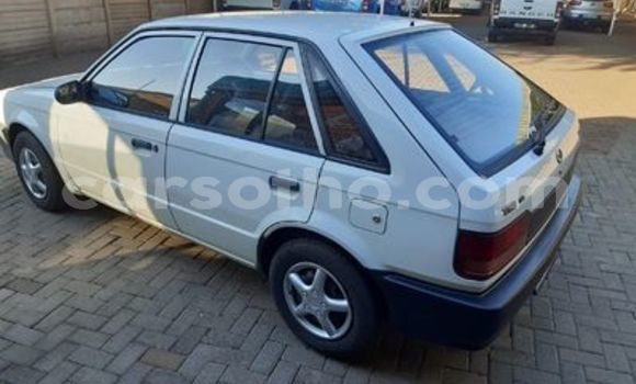 Sayi Na hannu Mazda 323 White Mota in Butha–Buthe a Thaba-Tseka Sayi Na hannu Mazda 323 White Mota in Butha–Buthe a Thaba-Tseka