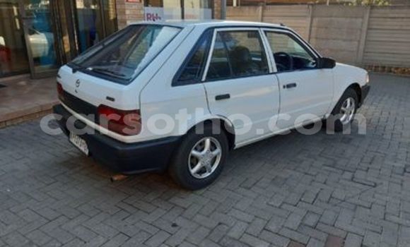 Sayi Na hannu Mazda 323 White Mota in Butha–Buthe a Thaba-Tseka Sayi Na hannu Mazda 323 White Mota in Butha–Buthe a Thaba-Tseka