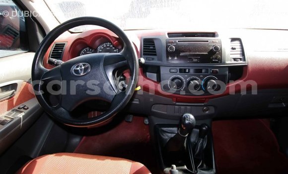 Sayi Imported Toyota Hilux Red Mota in Import - Dubai a Maseru Sayi Imported Toyota Hilux Red Mota in Import - Dubai a Maseru