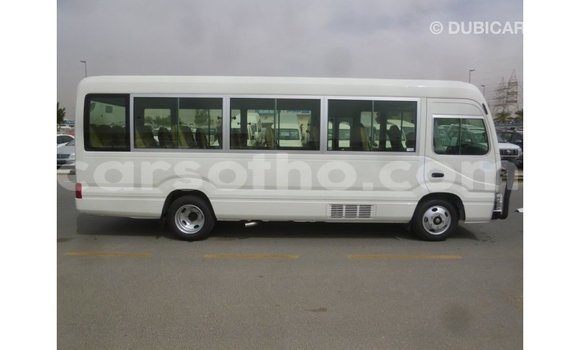 اشتري Imported Toyota Coaster White سيارة في Import - Dubai في Maseru اشتري Imported Toyota Coaster White سيارة في Import - Dubai في Maseru