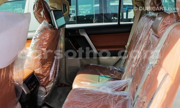 Sayi Imported Toyota Prado Red Mota in Import - Dubai a Maseru Sayi Imported Toyota Prado Red Mota in Import - Dubai a Maseru